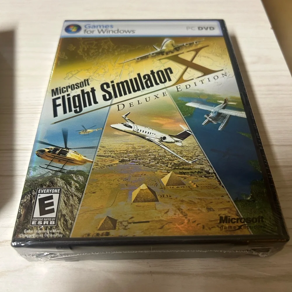 Microsoft Flight Simulator X Deluxe Edition with Blue and Gold Cover